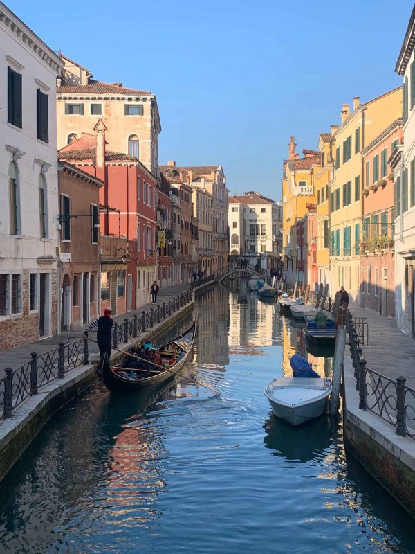 Gondola on a canal in Venice